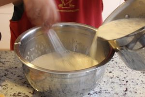 2pouring milk into egg